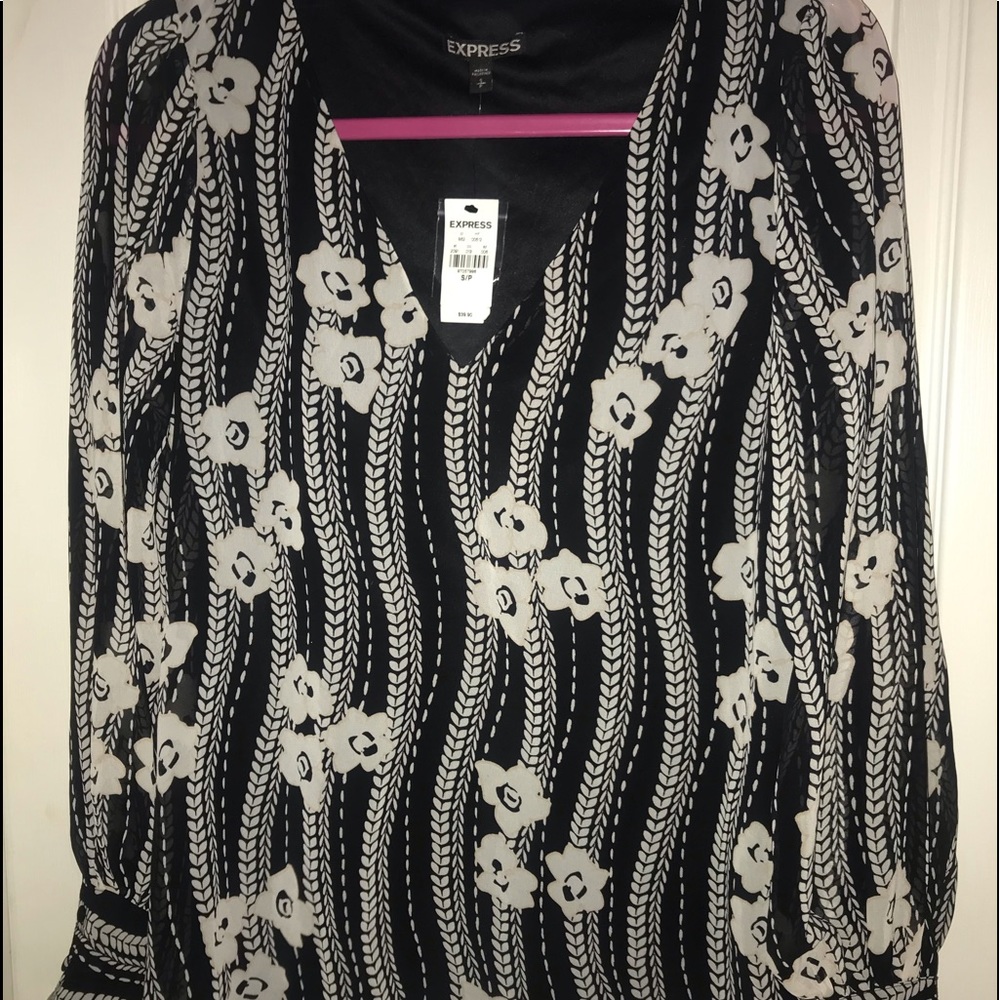 Express womens floral flowing long sleeved shirt. Size small. New with tags